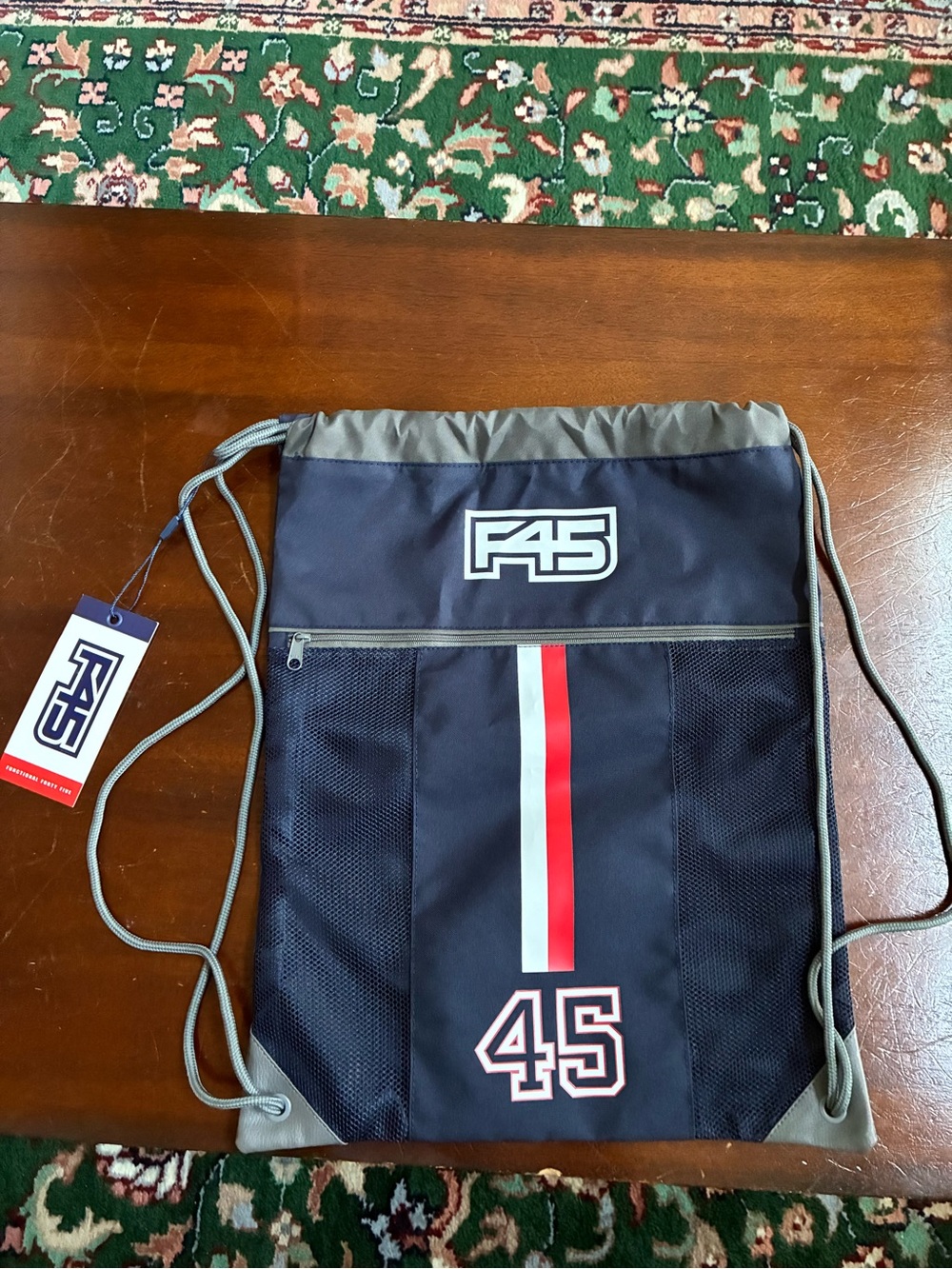 F45 Navy Drawstring Backpack with Red and White Stripe